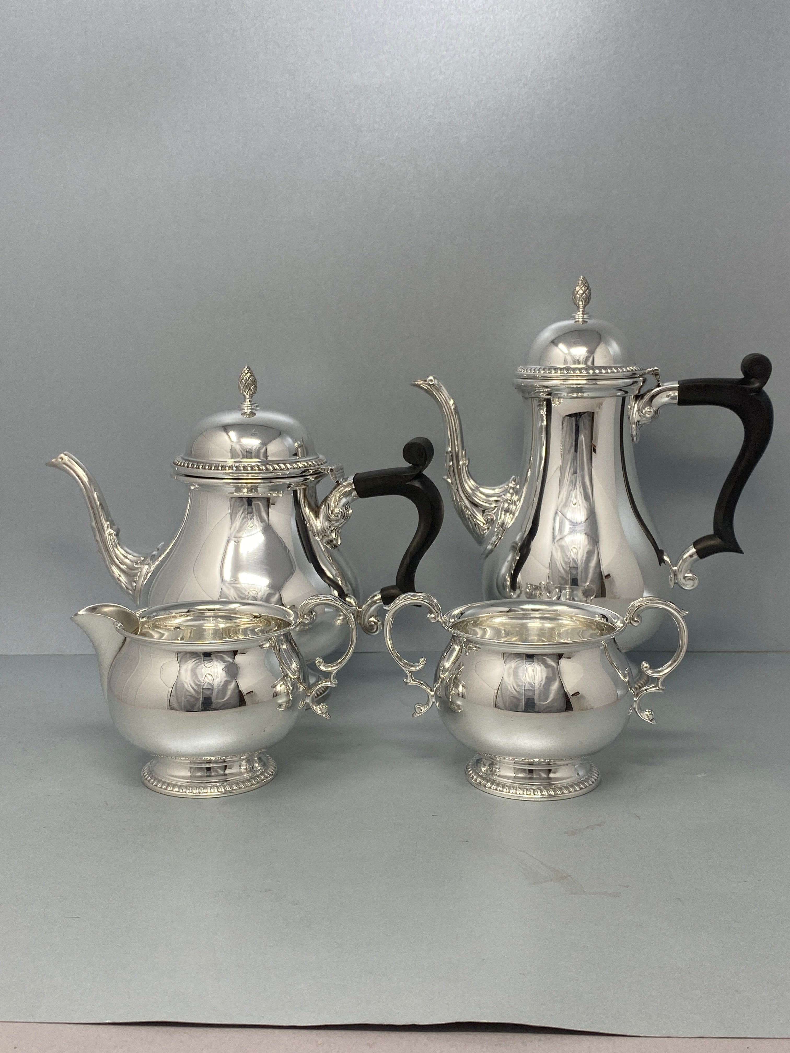 Four Piece Sterling Silver Tea Set by Barker Ellis