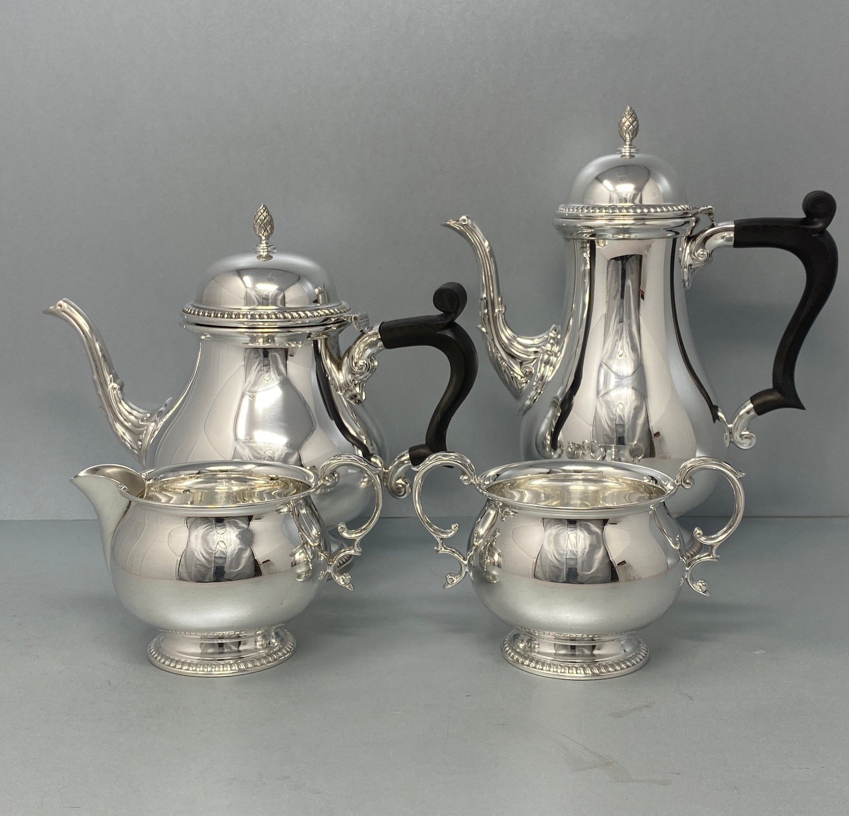 Four Piece Sterling Silver Tea Set by Barker Ellis