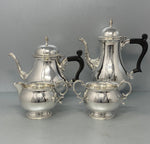 Load image into Gallery viewer, Four Piece Sterling Silver Tea Set by Barker Ellis
