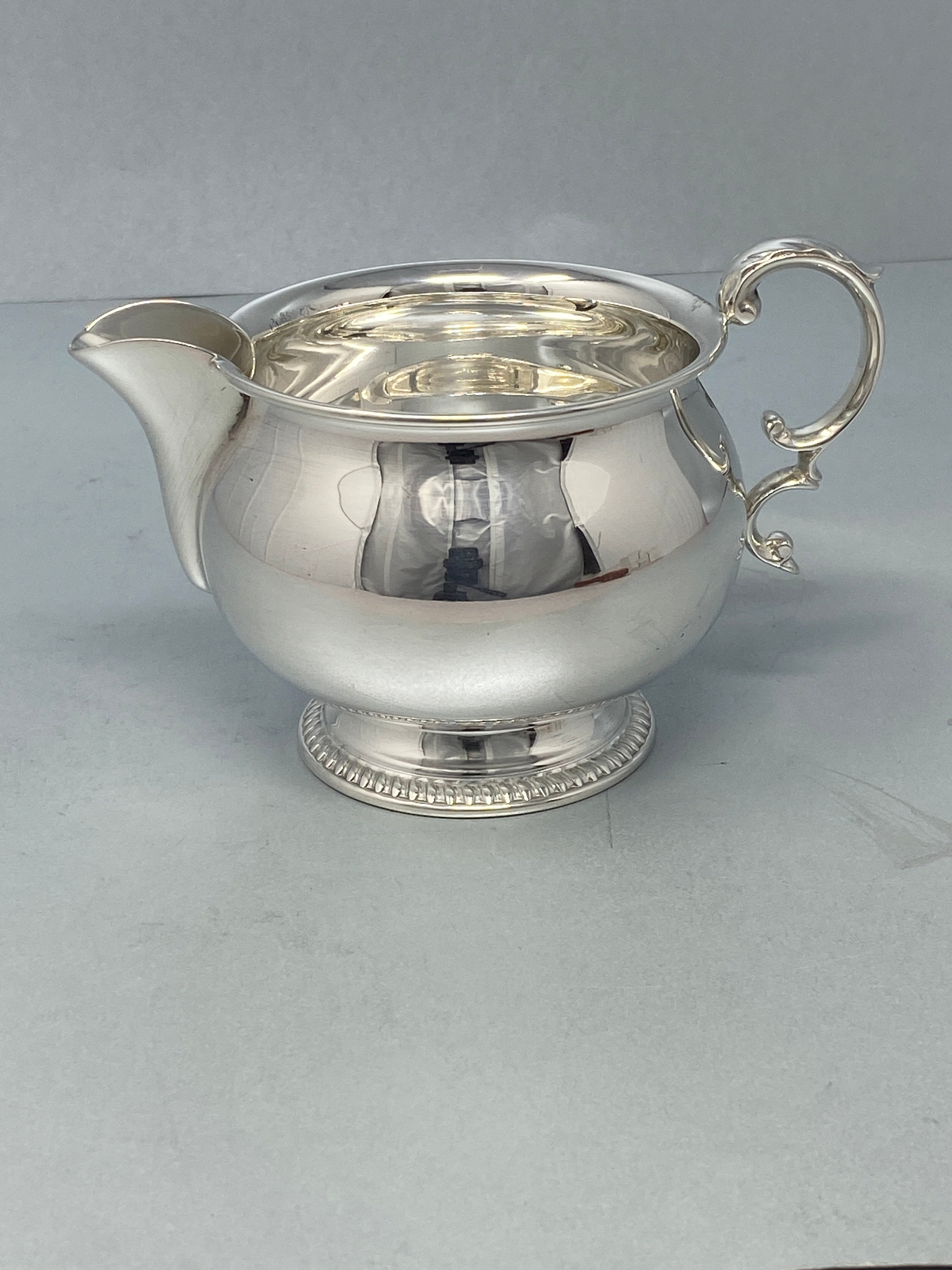 Four Piece Sterling Silver Tea Set by Barker Ellis