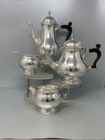 Load image into Gallery viewer, Four Piece Sterling Silver Tea Set by Barker Ellis
