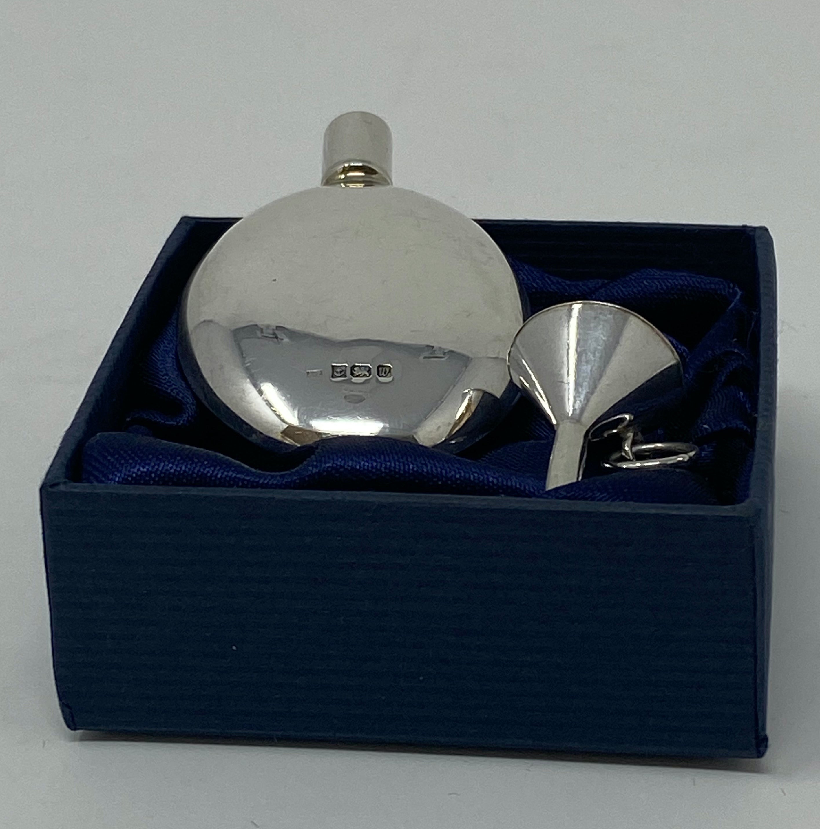 Silver Perfume Bottle and Funnel