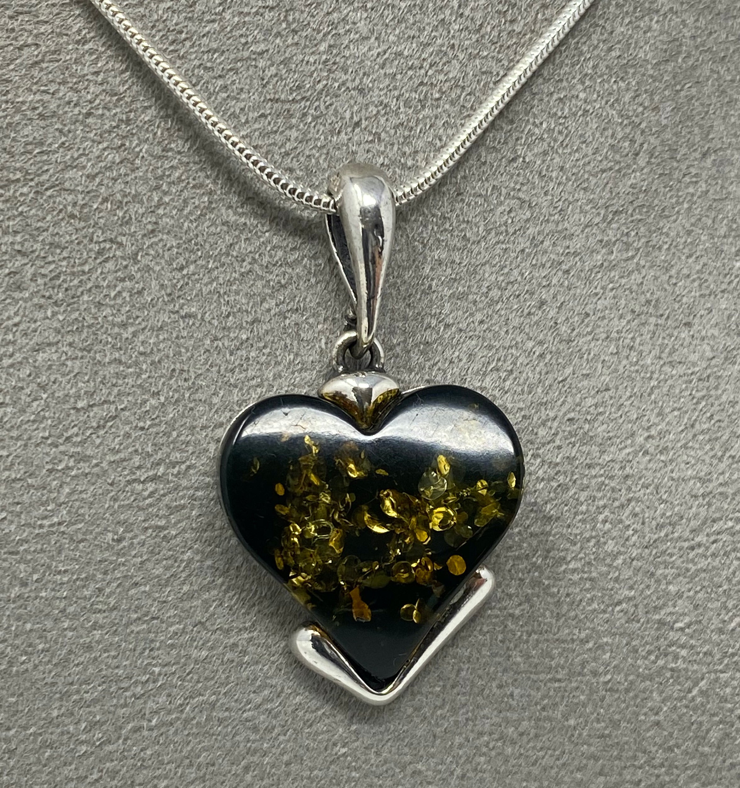 Green Amber Heart Pendant on silver chain