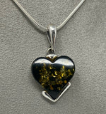 Load image into Gallery viewer, Green Amber Heart Pendant on silver chain
