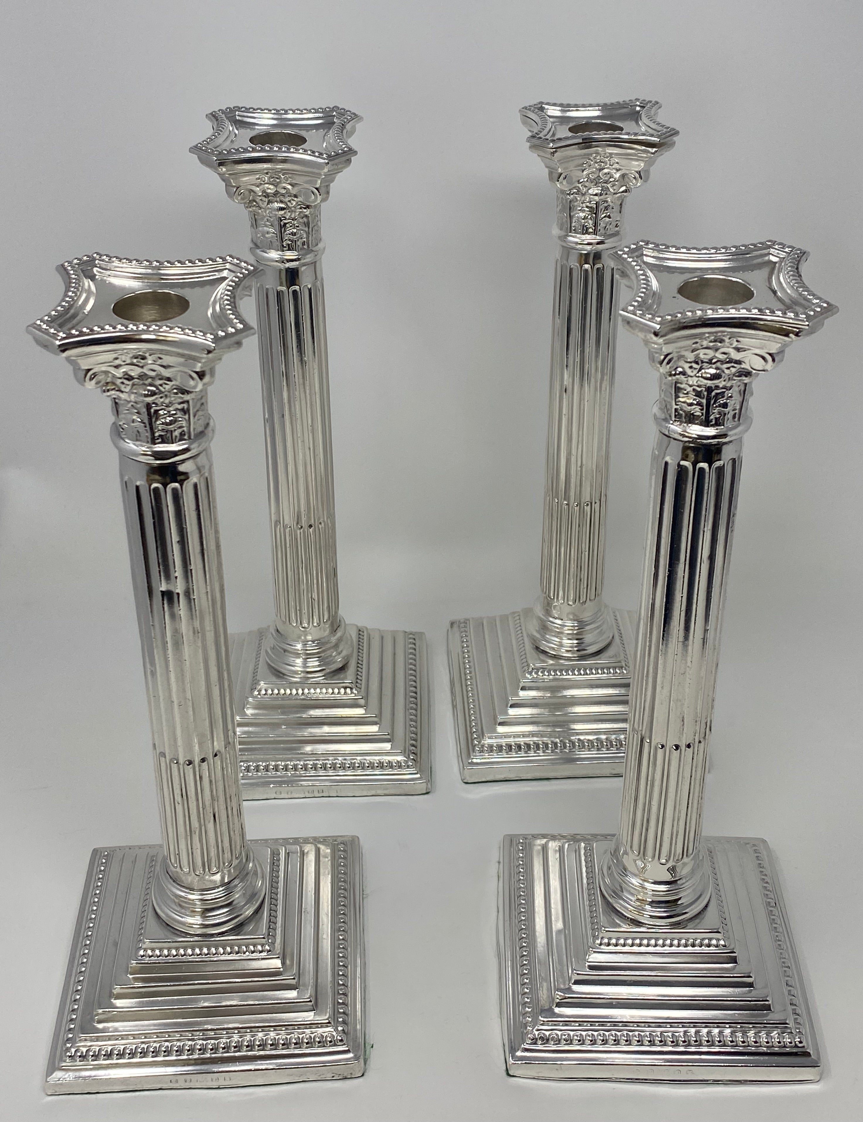 Set of 4 Silver Plated Corinthian Column Candlesticks
